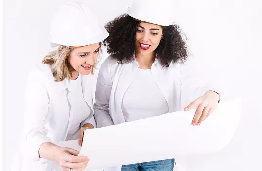 Engineers reviewing construction plans